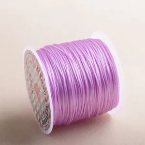 Close-up of durable purple stretchy crystal cord roll for jewelry DIY craft making