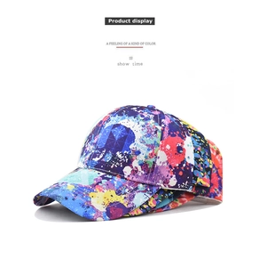 Detail shot of vibrant colorful graffiti patterns on a cotton baseball cap surface