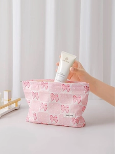Borsa da trucco rosa a scacchi con motivi a fiocco rosso ed etichetta H&R BAG chic