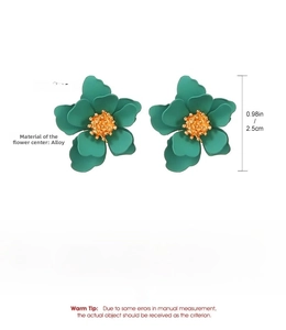 Detail view of matte green floral earrings with gold alloy center and size measurements