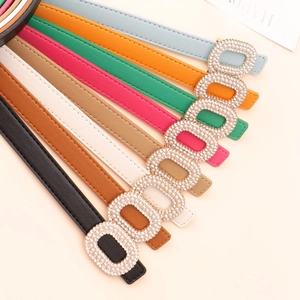 Set of slim faux leather belts for women with pearl buckles in various vibrant colors