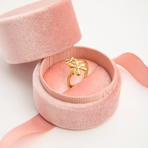 18k gold flower open ring presented in a luxury pink velvet jewelry gift box
