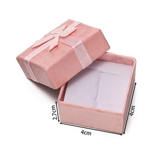 Pink jewelry gift box with ribbon and sponge lining showing 4x4x2.7cm dimensions