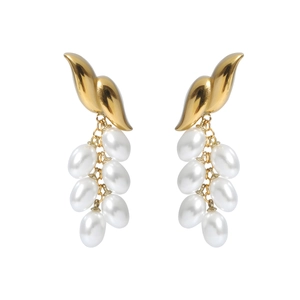 Elegant gold fringe wing earrings with white pearl clusters on a clean white background