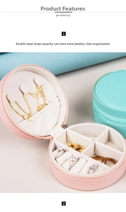Detail of round pink PU leather jewelry box with necklace hooks and ring compartments