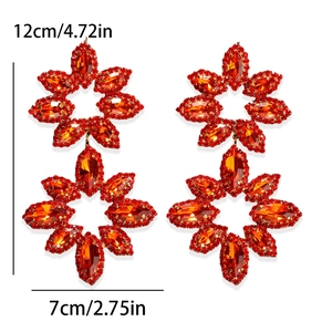 Exaggerated oversized flower earrings with sparkling rhinestones in red and orange
