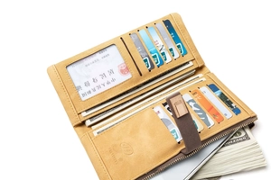 Detailed interior view of yellow vintage long wallet with multi-card slots and large capacity