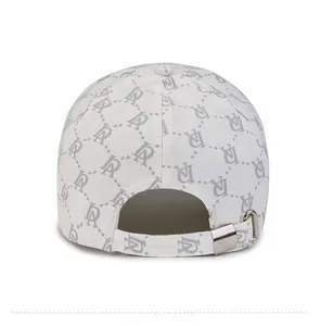 Rear view of white baseball cap with gray letter monogram and silver metal strap buckle