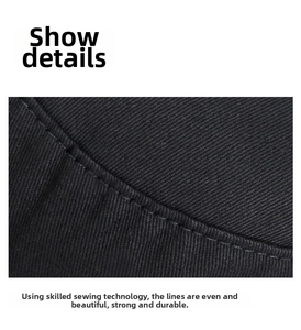 Close-up of black cotton twill fabric showing detailed stitching and premium texture