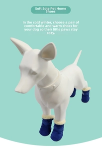 Detail of dog snow boots in dark blue with warm white fleece lining and Velcro strap