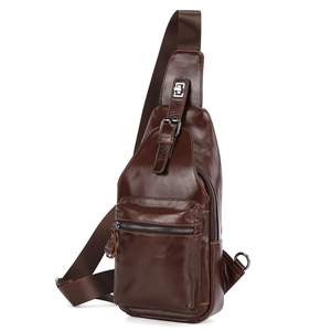 Side view showing multi-layer zippers and texture of a dark brown leather sling bag