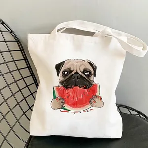 White canvas tote bag featuring a cute pug eating watermelon cartoon print