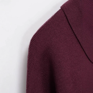 Women's polo knit sweater in wine red featuring a classic lapel and premium pocket detail