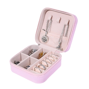 Pink portable faux leather jewelry organizer box with rings and necklace compartments