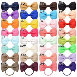 Grid display of 32 colorful grosgrain ribbon bow hair ties with unique color codes