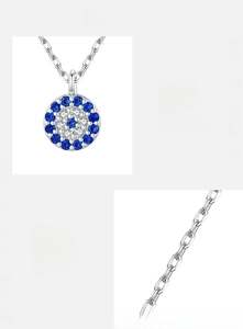 Detailed macro view of S925 silver necklace with 5A cubic zirconia blue eye pendant