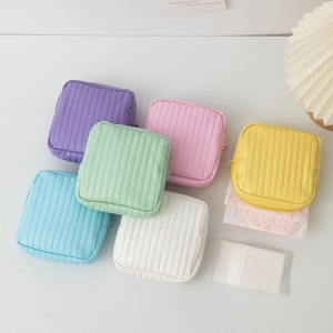 Quilted leather storage pouch in various candy colors for cosmetics and small items