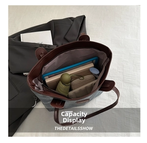 Top-down view of large canvas tote interior showing ample storage for daily essentials
