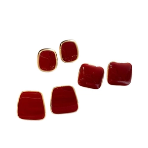 Elegant red enamel trapezoid geometric earrings with gold trim for a retro look
