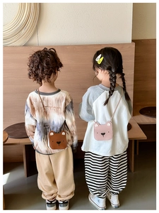 Kids PU leather bear crossbody bags in brown and pink colors with adjustable straps