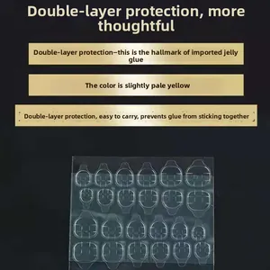 Close-up of double-sided jelly glue stickers for press-on nails with protective film
