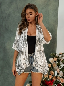White cardigan jacket with silver sequins and three-quarter sleeves for beach vacation