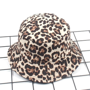 Close-up of leopard print bucket hat with high-quality suede texture and wide brim