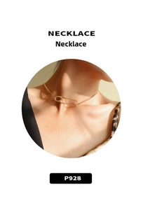 Macro shot of 18K gold plated safety pin necklace with elegant woven chain detail