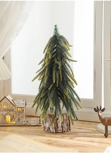 Miniature PE flocked Christmas tree with realistic pine needles and a solid wood base