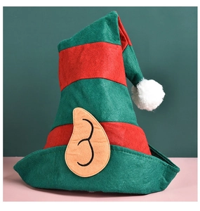 Detail of red and green striped felt elf hat with beige ears and white pompom topper