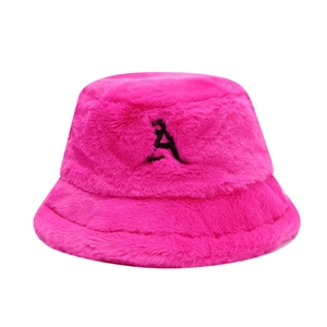Vibrant fuchsia plush bucket hat featuring a black letter A embroidery for winter