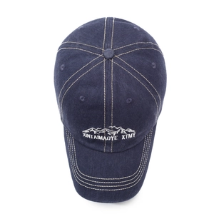 Retro washed navy baseball cap with white mountain embroidery and contrast stitching