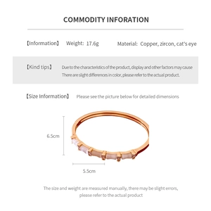 Détails du bracelet œil de chat, dimensions 6,5 cm par 5,5 cm et poids de 17,6 g