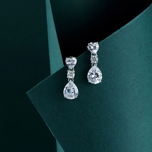 Elegant 925 sterling silver drop earrings with heart and pear-cut cubic zirconia stones