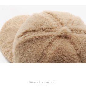 Close-up of thick sherpa fleece texture and stitching on a khaki winter baseball cap