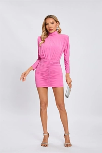 Detail of pink high-neck dress featuring elegant ruffles and sparkling rhinestones