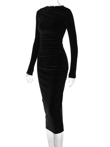 Detailed view of black velvet ruched midi dress with soft texture and side draping