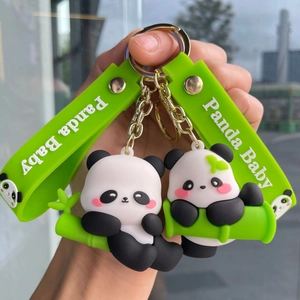Cute cartoon panda baby keychain with green bamboo and silicone wrist strap
