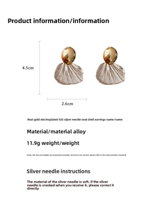 Detail view of oval shell earrings with dimensions 4.5cm by 2.6cm and 925 silver needles