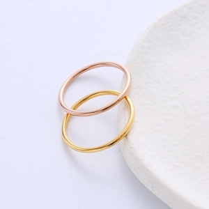 Minimalist titanium steel thin rings in gold and rose gold finish for stacking