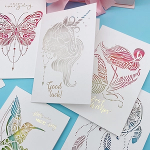 Detailed laser-cut 3D greeting cards featuring butterflies, flamingos and unicorn designs