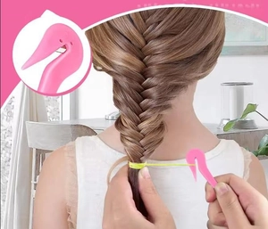 Pink topsy tail hair tool used for creating a complex fishtail braid hairstyle