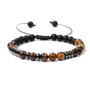 Detail of adjustable woven cord bracelet with matte onyx and tiger eye beads