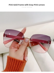 Detail of rimless gradient purple sunglasses with gold bridge and pink metal temples