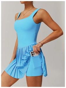 Sky blue pleated tennis dress showing side pocket for phone storage and safety shorts