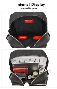 Detail view of the black nylon backpack interior with multi-functional storage compartments