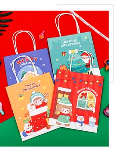 Detail of colorful Christmas paper gift bags with snowman and reindeer illustrations