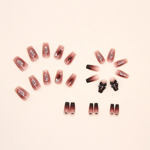 Elegant red gradient press-on nails with white hand-painted roses and 3D bow charms