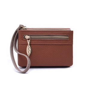 Brown lychee texture leather coin purse with leaf-shaped zipper pull and wrist strap