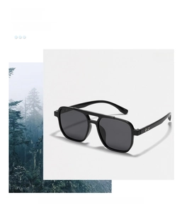 Detail of black TR90 polarized sunglasses with double bridge aviator frame and functional lens